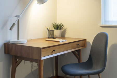 Counselling room with wooden desk