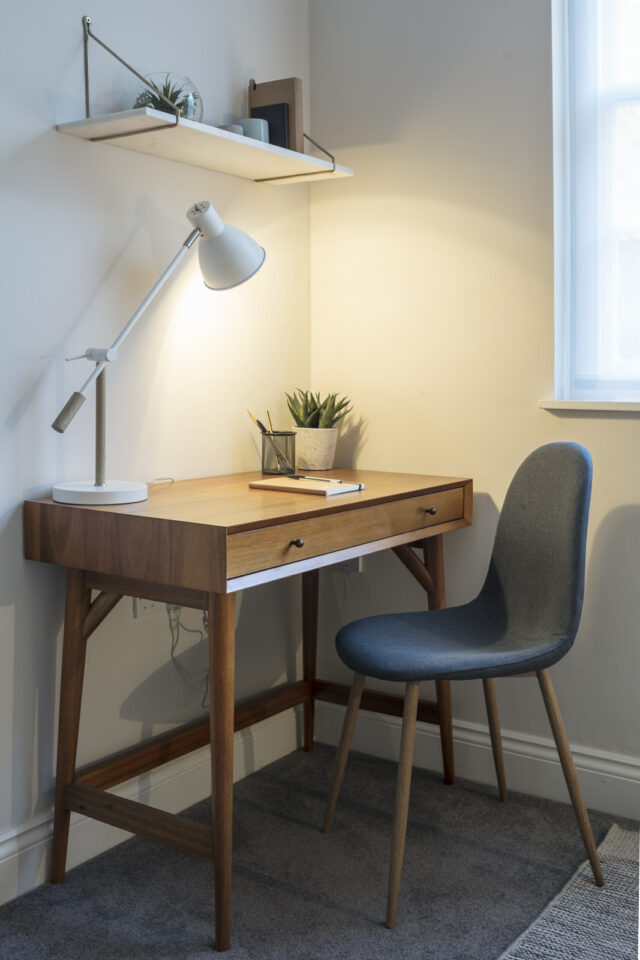 Counselling room with wooden desk